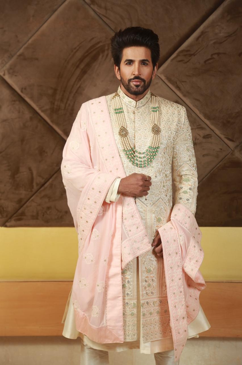Vishal Kotian in our traditional pink and white sherwani